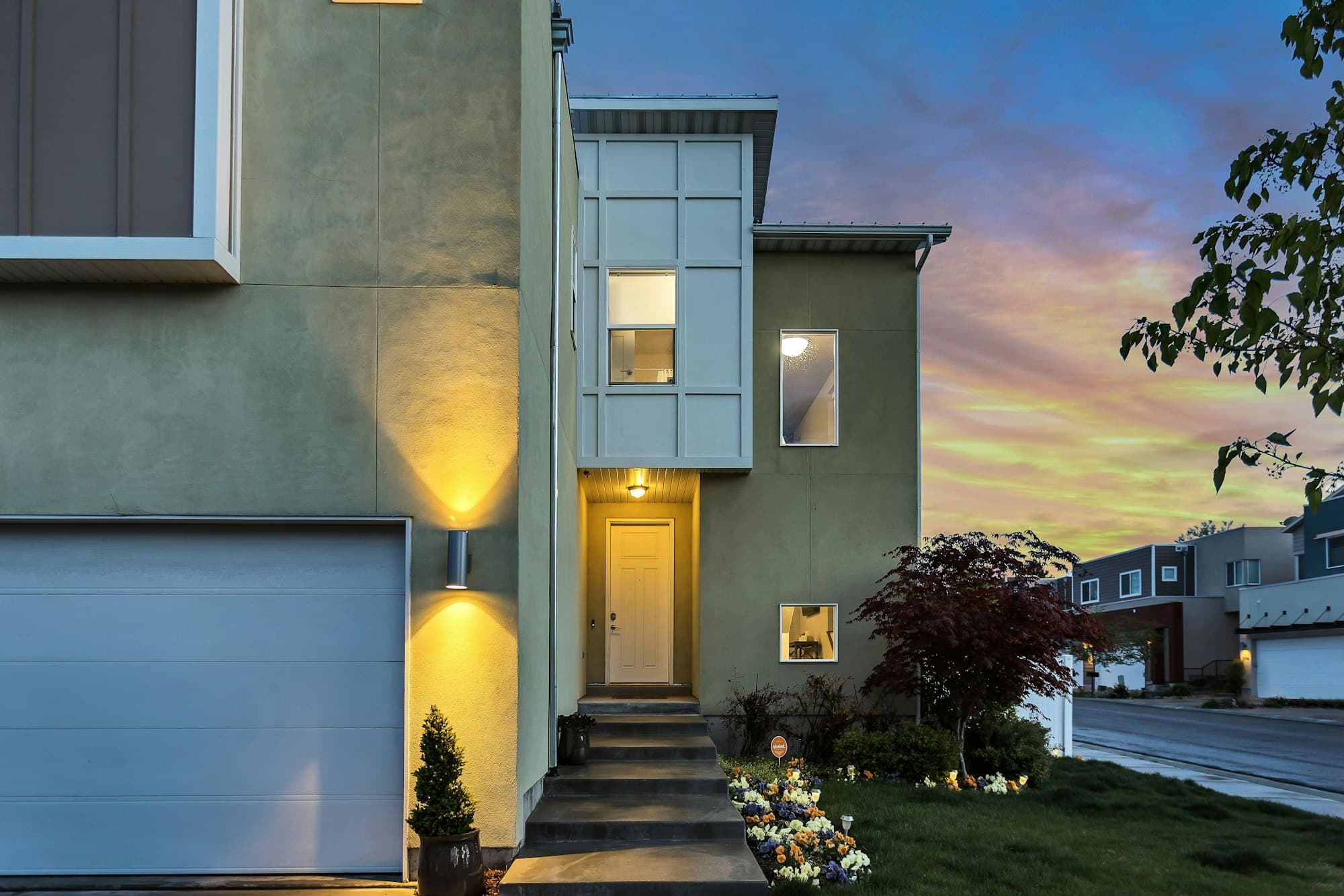 Twin Cities home with new windows and entry door at dusk
